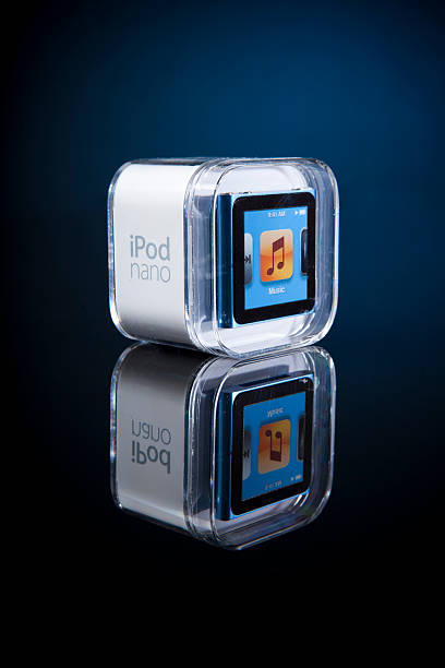 6th Generation Apple iPod Nano Portland, Oregon, USA - October 10, 2011: 6th Generation Apple iPod Nano with Multi-Touch technology displayed in its original packaging. ipod nano stock pictures, royalty-free photos & images