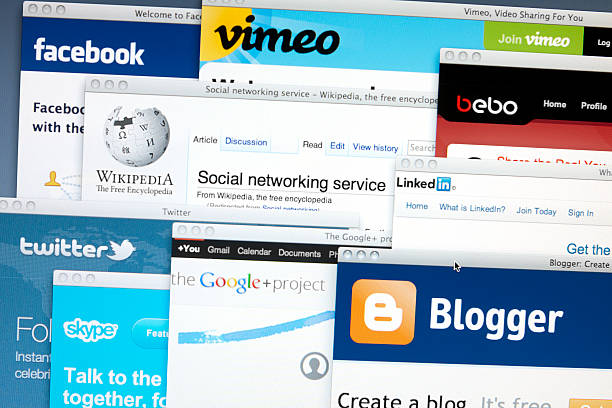 Social Networking Websites "Philadelphia, USA - June 28, 2011: The Wikipedia page on ""Social networking service"" is surrounded by the home pages of many of the most popular social networking websites, including facebook, vimeo, bebo, Linkedin, Blogger, Google+, skype and twitter. Social networking websites provide a user a platform for interacting and sharing information with people around the world. They have quickly become some of the most popular and important websites on the internet." wikipedia stock pictures, royalty-free photos & images
