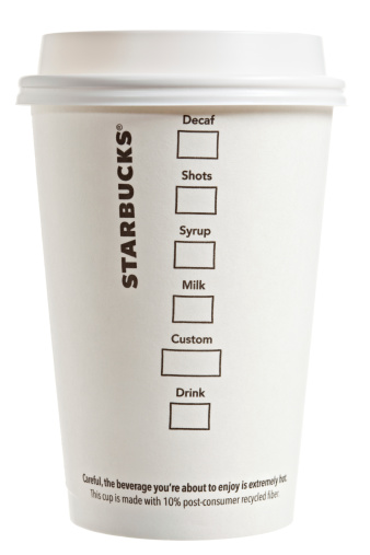Chico, California, USA - March 08, 2011 : The flip side of a Starbucks paper coffee cup is used to note the customers preference and it also warns the customers that  their drink is extremely hot. Seattle based Starbucks operates a worldwide chain of over 15,000 coffee houses.