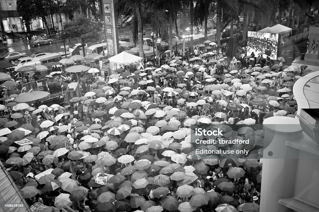 Democrat Party Political Rally In Bangkok, Thailand "Bangkok, Thailand - June 23, 2011: People showing their support for Thai Prime Minister Abhisit Vejjajiva and The Democrat Party (Phak Prachathipat) at a political rally outside Central World Shopping Centre at Ratchaprasong intersection." Asia Stock Photo