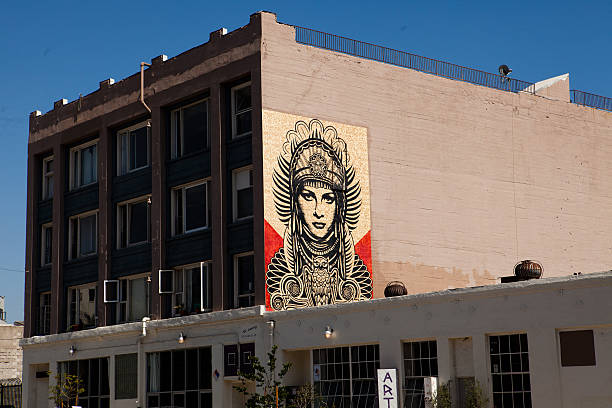Los Angeles, California, USA - July 1, 2010: A Shepard Fairey mural hangs on the side of a building in downtown Los Angeles.  Shepard Fairey became well known for his Barack Obama \