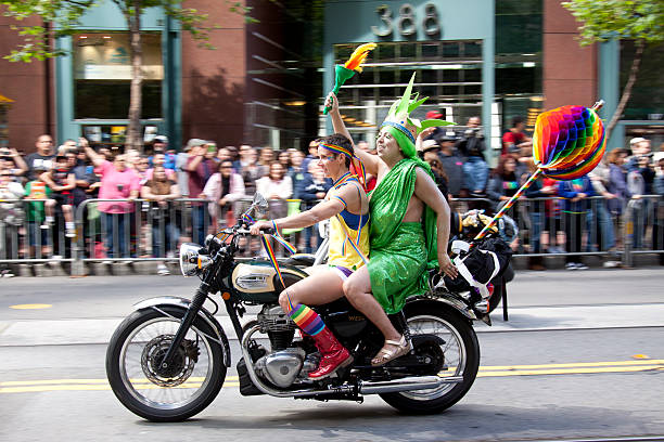 San Francisco, California, USA - June 26, 2011: The annual S.F. Gay Pride Parade gets started with the contingent of Dykes on Bikes roaring down Market Street. Here one rider is dressed as the Statue of Liberty after New York's recent legalization of gay marraige. Considered to be one of the largest and most well-known Pride events in the world, this year's parade was the 41st and featured more than 200 floats and19 stages scattered around the city.