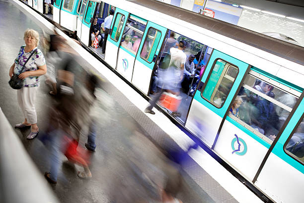 Paris, France - April 8th, 2024: Speeding subway at the metro station Bir-Hakeim near by the Eifel tower.