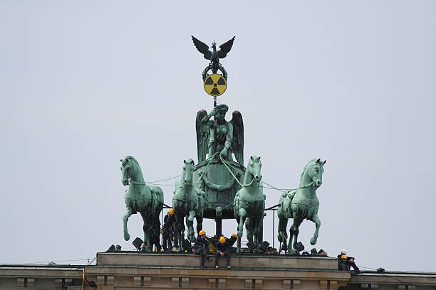 Greenpeace Activists on Brandenburger Tor in Berlin stock photo