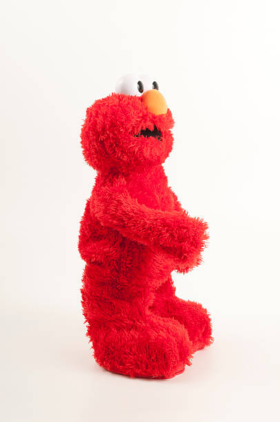 elmo plüschspielzeug profil - sesame street fotos stock-fotos und bilder