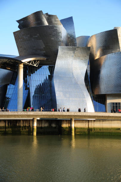 Guggenheim Museum, Bilbao, Spain, Architect Frank Gehry, 1997, Guggenheim Museum Detail Of Curving Titanium Wall. Guggenheim Museum Bilbao is a museum of modern and contemporary art . Built alongside the Nervion River, which runs through the city of Bilbao to the Cantabrian Sea