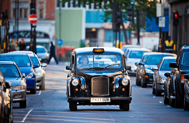 london black cab - black cab stock-fotos und bilder