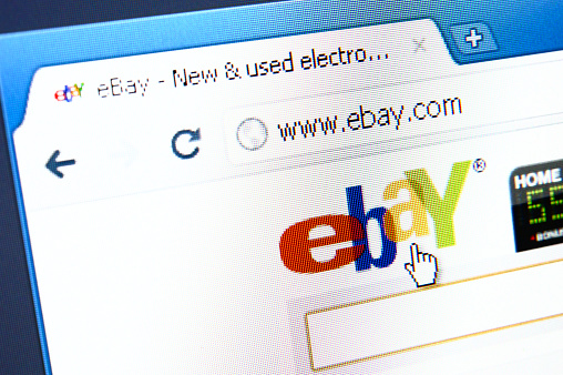 Izmir, Turkey - March 16, 2011: Close up of eBay\'s main page on the web browser. eBay is one of the largest online auction and shopping websites in the world.