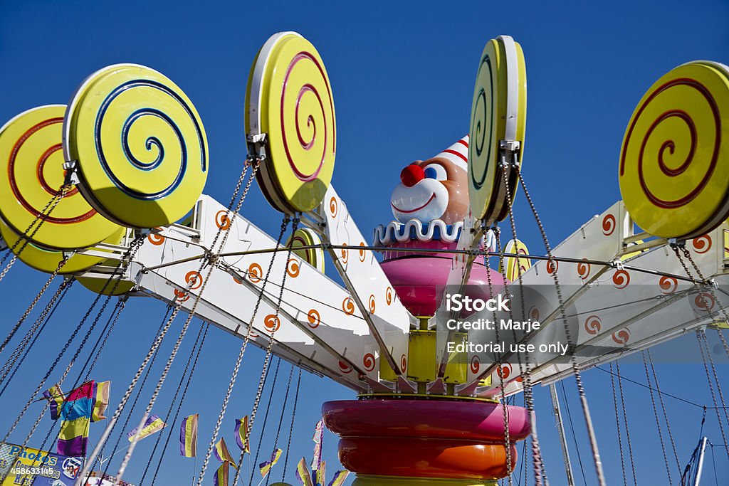 Paseo en Parque de diversiones payaso - Foto de stock de Actividades recreativas libre de derechos