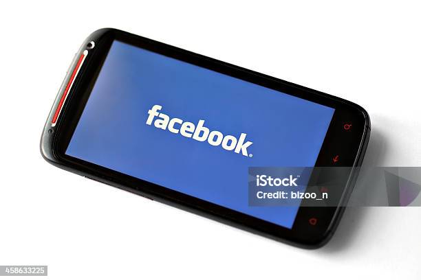 Facebook Logo On A Smartphone Screen Stock Photo - Download Image Now - Social Media, Logo, Mail