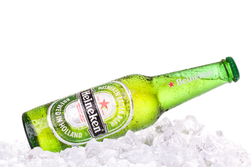 Izmir, Turkey - May 29, 2011: 330ml Heineken beer bottle on ice. Heineken beer is brewed by Heineken Brewing Co. Holland.