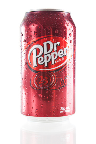 Calgary, Alberta, Canada - March 2011. Product shot of a can of Dr Pepper with water droplets. Dr Pepper was created in the 1880s by Charles Alderton of Waco, Texas and first served around 1885.