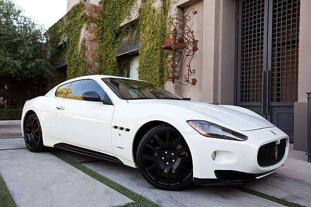 Scottsdale, United States - October 20, 2011: A photo of a parked white Maserati Gran Turismo coupe. The Gran Turismo's design was based off of Maserati's well known sedan the Quattroporte.