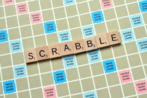 Vancouver, Canada -- September 13, 2011:Close up of Scrabble spelled out on a Scrabble game board.  Scrabble is a word board game that is available in over 120 countries worldwide.