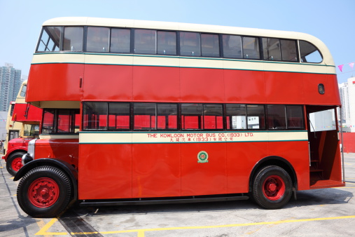 Hong Kong, China - March, 13th 2011: Kowloon Motor Bus Daimler A parked in Sha Tin Bus Station for display. It is first double-decker bus in Hong Kong. This bus was introduced by Kowloon Motor Bus in 1949. It featured the British open rear platform.