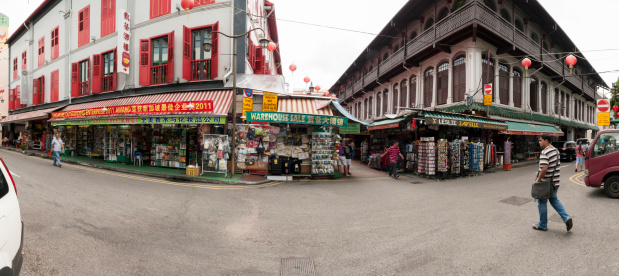 Singapore, Singapore - April 25, 2012: Panoramic view of China Town of Singapore, visitors walking at Smith Street, a pedestrian stree with pre-war shophouse, and stree markets stalls, a foumos torist attraction area of Chinatown.