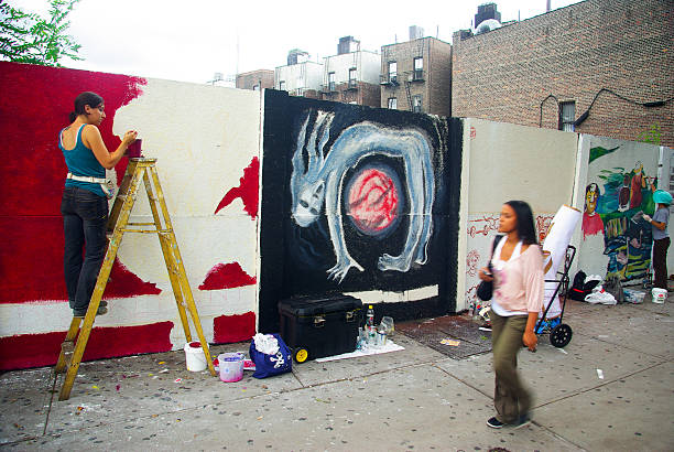 Brooklyn New York September 13, 2009; PLG Arts artists paint wall mural in Brooklyn New York