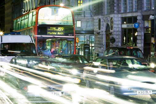 London, United Kingdom - November 9, 2008: Night traffic on Regent Street, one of the busiest shopping streets in London.