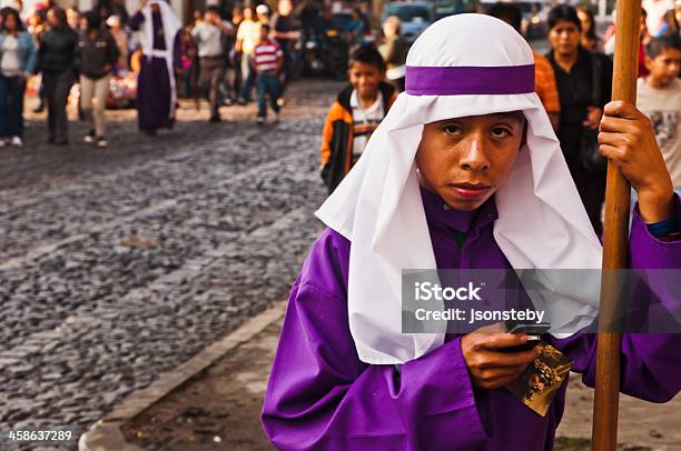 Purple Robed Boy On Cell Phone Stock Photo - Download Image Now - Antigua - Western Guatemala, Boys, Celebration Event