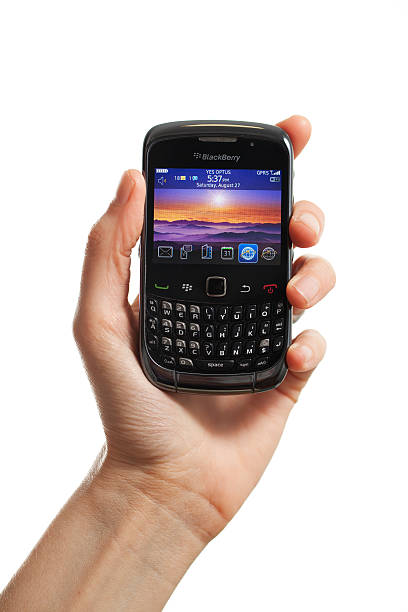 hand holding blackberry-telefon - blackberry mobile phone smart phone human hand stock-fotos und bilder