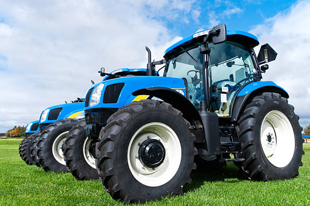 Modern combine harvester working in a wheat field.