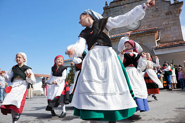 Asturias "Quintes, spain.09-25-2010. Children dancing in asturian traditional clothing. Outside the church." asturias photos stock pictures, royalty-free photos & images