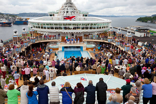Bergen, Norway - June 30th, 2010: Passengers aboard the P&O cruise ship Azura are entertained by crew members at a \\\