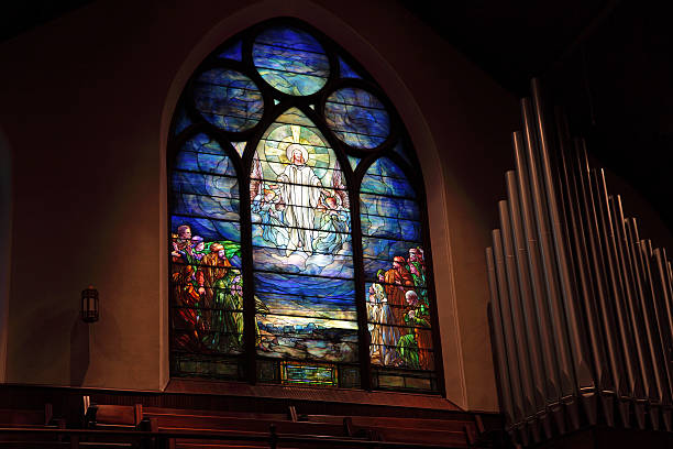 Tiffany Stained Glass Showing the Ascension of Jesus stock photo