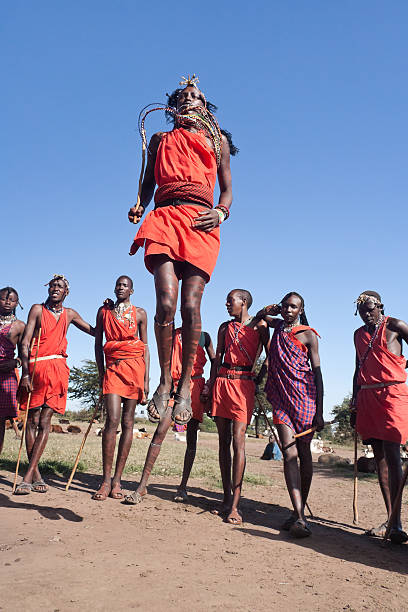 Maasai warriors Serengheti, Kenya, May 23, 2006. Masai warriors in traditional costume during a ritual. ceremonial dancing stock pictures, royalty-free photos & images
