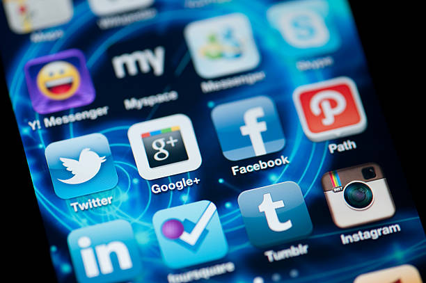 Istanbul, Turkey - Jul 03, 2011: Apple Iphone screen with social media applications of Google Plus, Myspace, Facebook, Twitter, Path, Foursquare, Linkedin and Messenger.