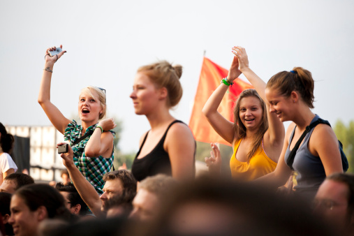 BUdapest, Hungary - August 15, 2010: Crowd having fun during a concert in the main stage area of the Sziget Festival. The Sziget is one of the most important music and arts festival in the world. It takes place every august in Obuda island, close to Budapest.