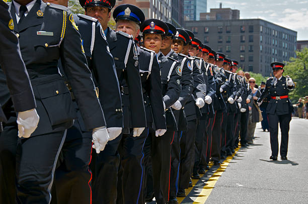 toronto polícia no nypd cerimônia memorial, 9 de setembro de 2011, nova york - editorial shadow new york city manhattan - fotografias e filmes do acervo