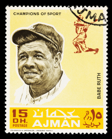 Sacramento, California, USA - February 8, 2009: A 1969 Ajman postage stamp in the Champions of Sport series. This stamp features Babe Ruth, known as the Sultan of Swat.  The stamp was printed by Poligrafica and Carte Valori of Ercolano, Naples.