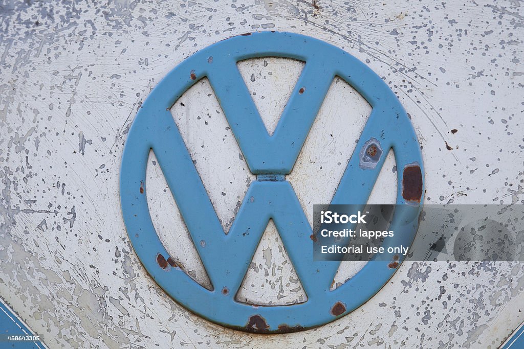 VW Logo M&amp;amp;uuml;nchen, Germany - September 17, 2011: VW Logo mounted on a vintage camping car. VW called Volkswagen is the biggest car manufacturer in Germany Car Stock Photo