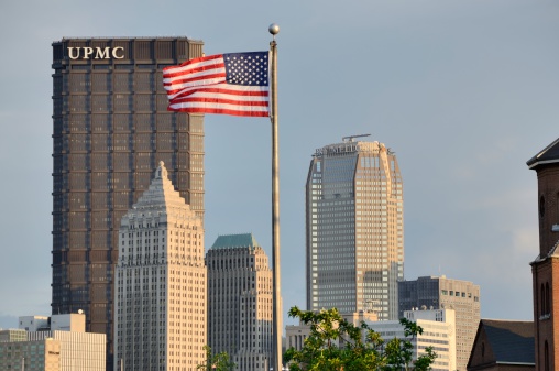 Pittsburgh, Pennsylvania, USA - June 2, 2012: The Pittsburgh skyline in late afternoon light. Prominently featured on the left is the US Steel tower, housing the administrative center of the University of Pittsburgh Medical Center (UPMC). Center right is the BNY Mellon Center, Pittsburgh's second tallest building.