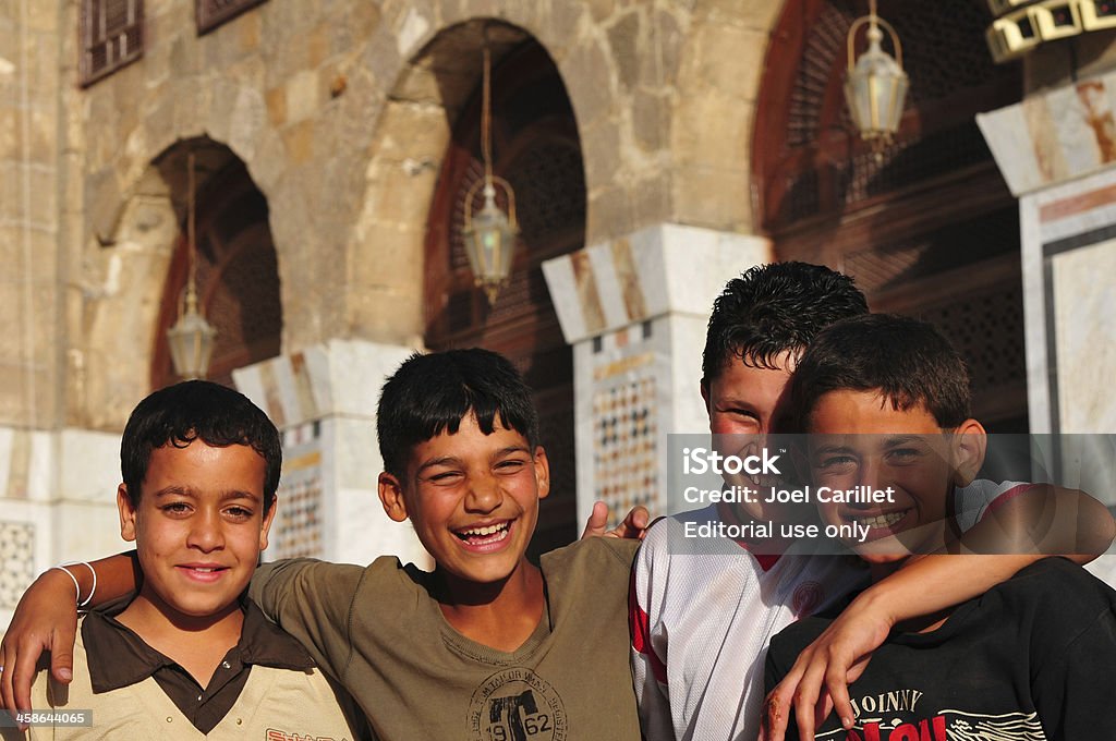Sírio meninos no Umayyad Mesquita de Damasco - Foto de stock de Síria royalty-free