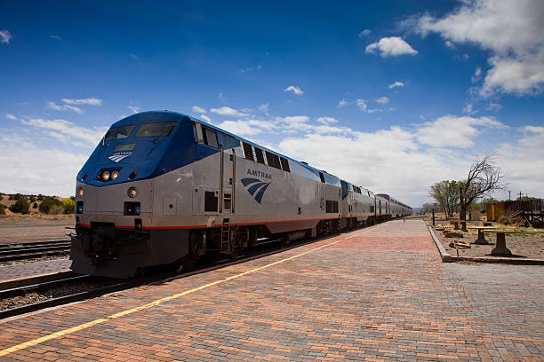 Los Angeles, California, USA - July 16, 2023: An Amtrak passenger train engine pulls into Union Station.