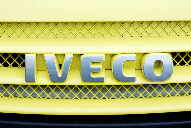 Liverpool, England - February, 19 2011: Iveco logo on an Iveco Daily van ambulance parked in the streets of Liverpool. Iveco is an Italian truck, bus, and diesel engine manufacturer, based in Turin. The firm is a subsidiary of Fiat Industrial.