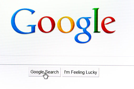 Kyiv, Ukraine  - February 20, 2011: Google logo in the browser page and mouse pointer over \\\