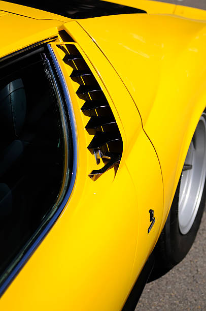 Lamborghini Miura S Spa, Belgium - June 29, 2008: Air intake detail on a classic yellow Lamborghini Miura S sports car. The car was on display during the 2008 Spa Italia event. lamborghini miura stock pictures, royalty-free photos & images