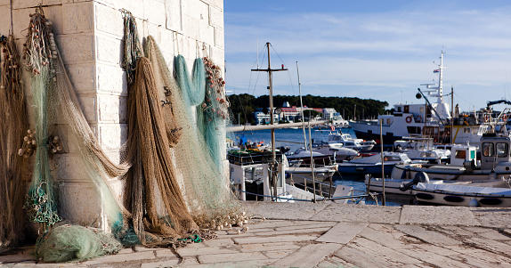 Rovinj, Croatia - October 16, 2009: Fishernet dry at the port of Rovinj in Croatia. 