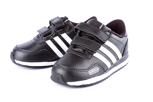 Izmir, Turkey - February 6, 2012: Studio shot of adidas sport shoes. Adidas AG is a German sports apparel manufacturer and parent company of the Adidas Group.