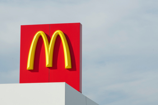 Melbourne, Australia - September 3, 2011: Nice clean McDonald\'s sign placed left of frame. A modern example of McDonald\'s corporate identity.