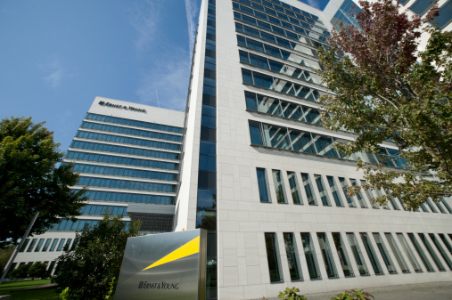 Eschborn,  Germany - October 4, 2011: Logo of Ernst and Young at the facade of their office building in Eschborn. The is heatquartered in London.  They are one of the largest professional services and accountancy firms in the world.