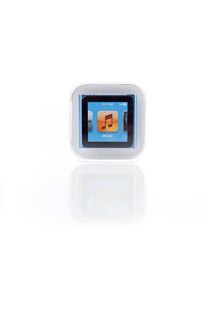 6th Generation Apple iPod Nano Portland, Oregon, USA - October 10, 2011: 6th Generation Apple iPod Nano shown in its original packaging. Apple is known for having high end packaging to accompany its products. ipod nano stock pictures, royalty-free photos & images