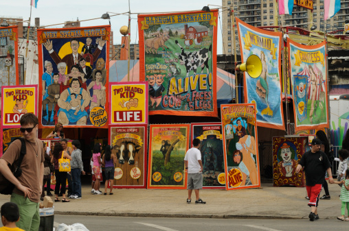 BROOKLYN, UNITED STATES - June 4, 2011: A tent advertises the many attractions of the Coney Island freak show.