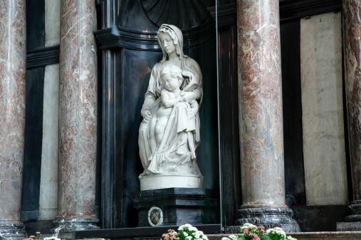 Statue of Saint Begga outside Saint John the Baptist Church at the Béguinage in the City of Brussels. It is a 17th century Roman Catholic parish church built in the Flemish Baroque style.