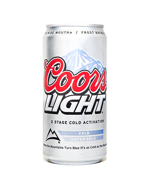 Coors Light Beer Can Nashville, Tennessee, USA - August 10th, 2011: A close up image of a Coors Light Beer Can with the signature blue cold activated mountains and red Coors logo photographed against a white background. COORS LIGHT stock pictures, royalty-free photos & images