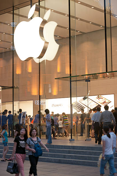 Shanghai, China - June 14, 2012: Apple Store in Nanjing Pedestrian Road, the most famous shopping area in Shanghai. Lots of pedestrian traffic.