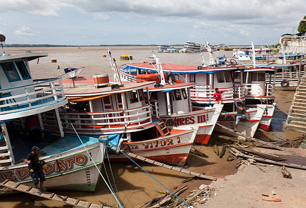Parintins, Brazil - March 15, 2010: Parintins is a city situated at the Amazonas river in Brazil. The picture shows typical boats at the Amazon river in Parintins.